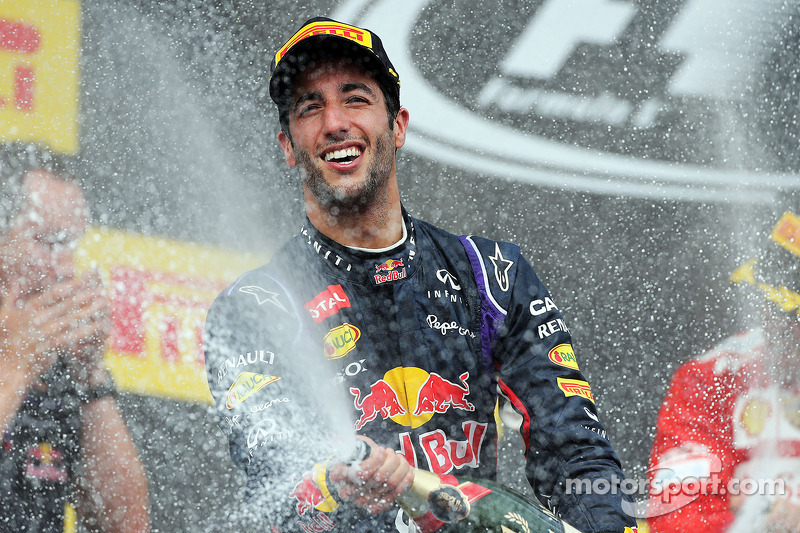 Daniel Ricciardo, Red Bull Racing celebrates with the champagne on the podium