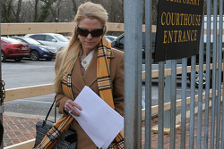 Patricia Driscoll leaves the Kent County family courthouse after a hearing regarding assault charges filed against Kurt Busch