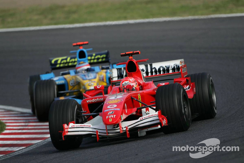 Michael Schumacher leads Fernando Alonso