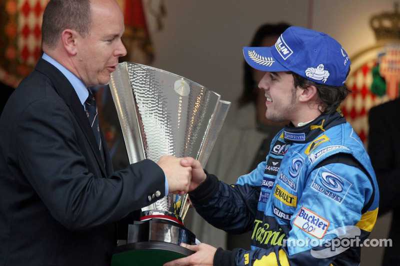 Podium: Race winner Fernando Alonso is congratulated by Prince Albert of Monaco