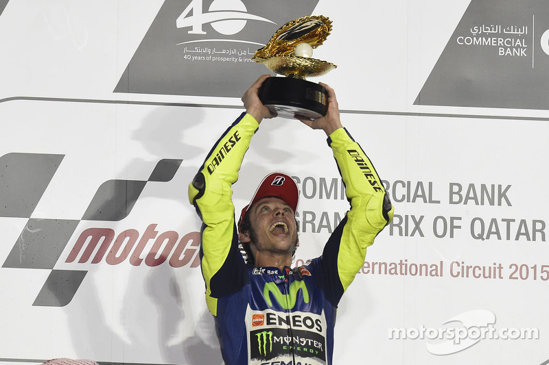 Podium: race winner Valentino Rossi celebrates