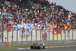 Romain Grosjean y su Lotus F1 E23