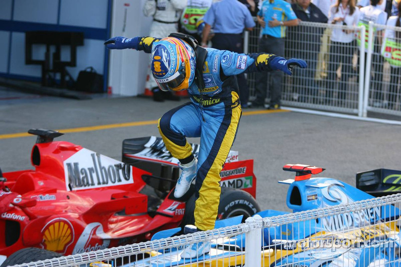 Race winner Fernando Alonso celebrates