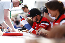 Will Stevens, Manor F1 Team and Roberto Merhi, Manor F1 Team sign autographs for the fans