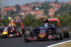 Carlos Sainz Jr., Scuderia Toro Rosso STR10 and Daniil Kvyat, Red Bull Racing RB11
