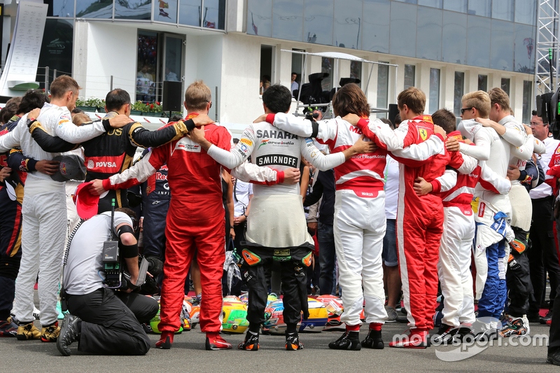 Drivers during minute of silence for Jules Bianchi