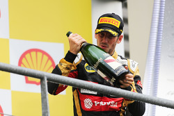 Romain Grosjean, Lotus F1 Team celebra su tercera posición en el podio