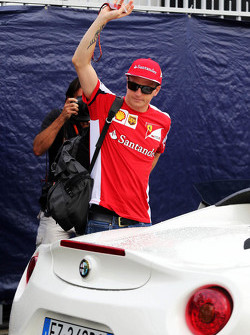 Kimi Raikkonen, Ferrari with his Alfa Romeo road car