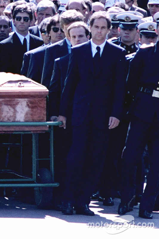 Gerhard Berger, Rubens Barrichello, Thierry Boutsen, Alain Prost and Damon Hill help lead the casket of Ayrton Senna during the funeral procession