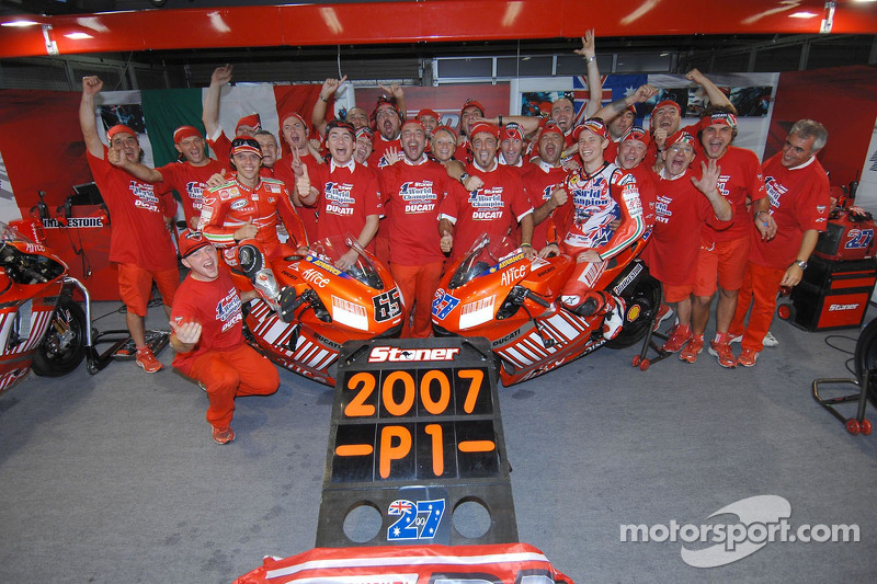 Celebrations at Ducati: 2007 MotoGP champion Casey Stoner and race winner Loris Capirossi celebrate 