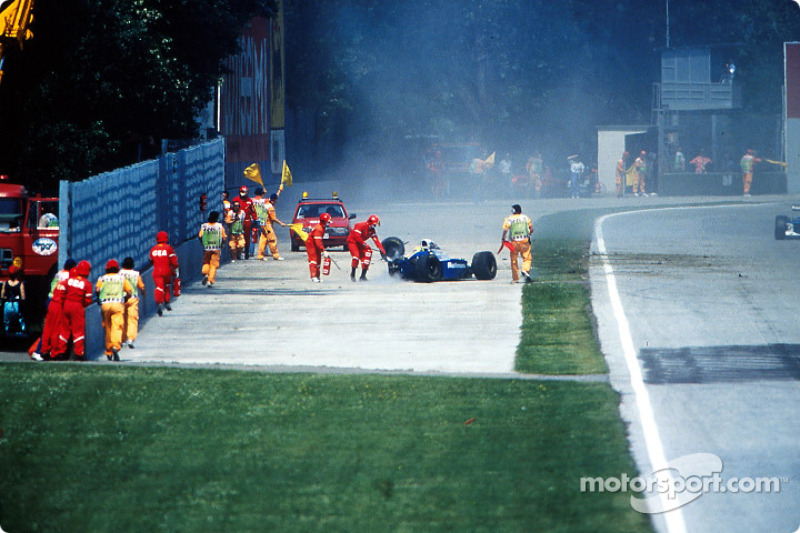 The fatal crash of Ayrton Senna at Tamburello: safety team members come to the rescue