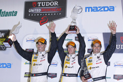 Overall podium: second place Joao Barbosa, Christian Fittipaldi, Sébastien Bourdais, Action Express Racing