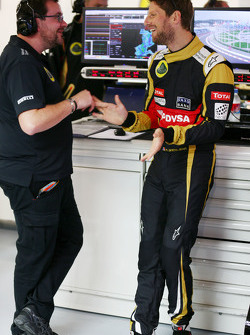 (L to R): Julien Simon-Chautemps, Lotus F1 Team Race Engineer with Romain Grosjean, Lotus F1 Team