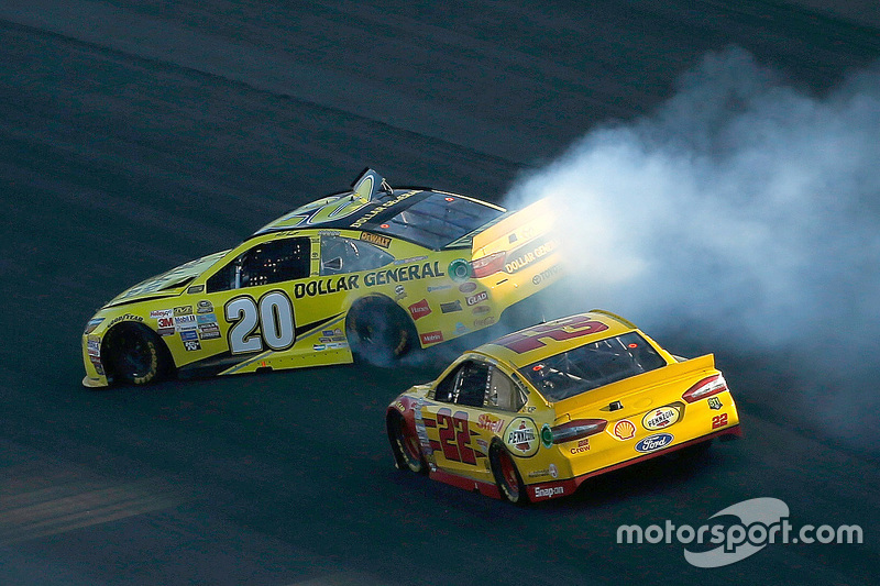 Matt Kenseth, Joe Gibbs Racing Toyota spins off the nose of Joey Logano, Team Penske Ford