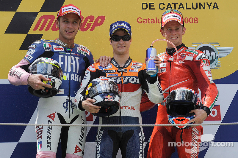 Podium: race winner Dani Pedrosa with Valentino Rossi and Casey Stoner