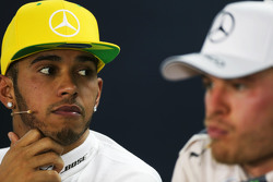 (L to R): Lewis Hamilton, Mercedes AMG F1 and team mate Nico Rosberg, Mercedes AMG F1 in the FIA Press Conference