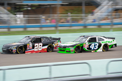 J.J. Yeley, JGL Racing Toyota and Dakoda Armstrong, Richard Petty Motorsports Ford