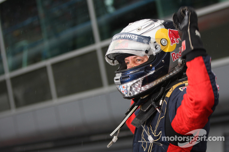 Pole winner Sebastian Vettel celebrates