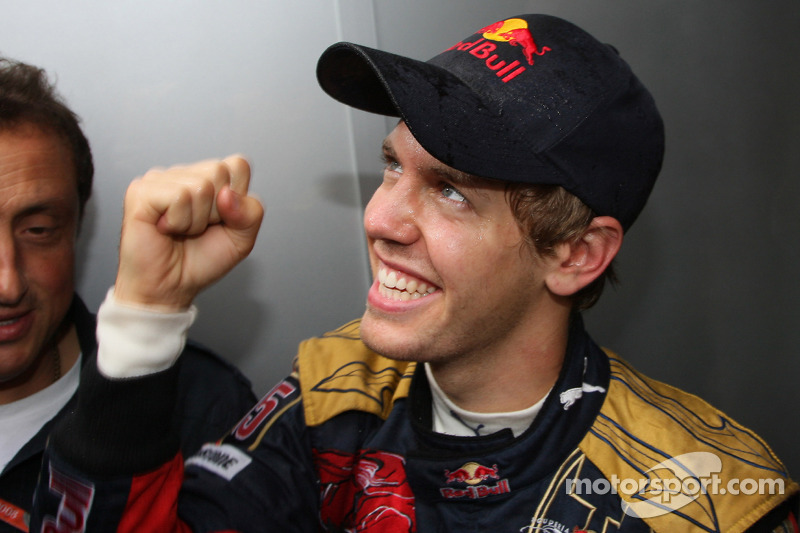 Pole winner Sebastian Vettel celebrates