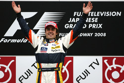 Podium: race winner Fernando Alonso celebrates