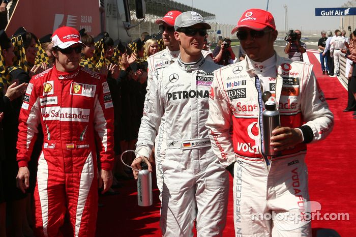 Fernando Alonso, Scuderia Ferrari con Michael Schumacher, Mercedes GP y Lewis Hamilton, McLaren Merc